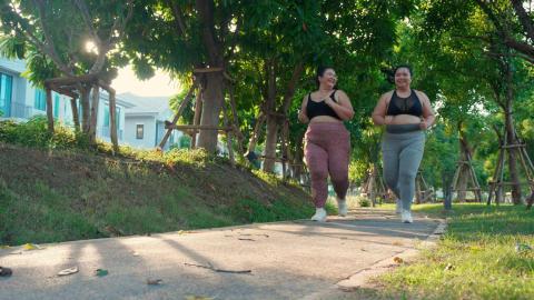 Two women running.